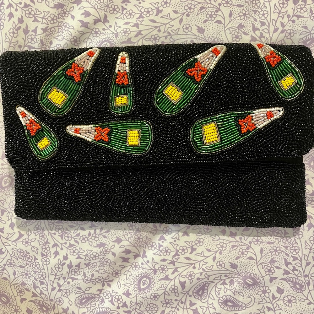 Beaded Francesca’s clutch with gold chain with a fun sparkly design! *NWT*
